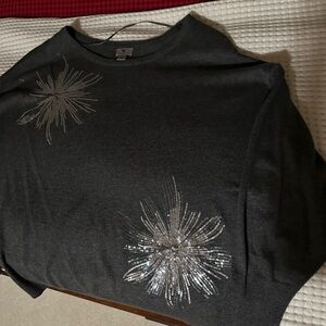 Elegant soft sweater very classy I got it from jcpenny size large